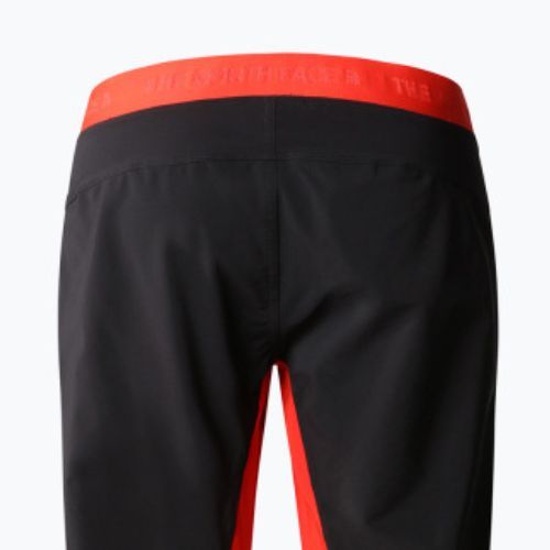 Pantaloni de drumeție pentru bărbați The North Face Felik Felik Slim Tapered roșu/negru NF0A825WWU51