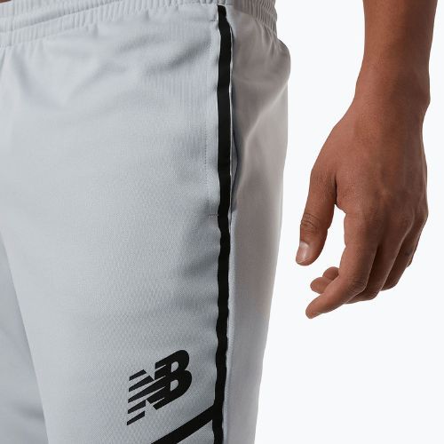 Pantaloni de antrenament pentru bărbați New Balance Tenacity Football albastru NBMP23091LAN