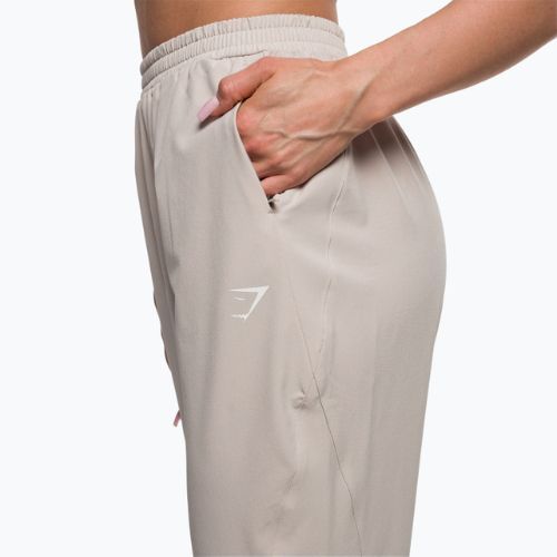 Pantaloni de trening pentru femei Gymshark Maximise Track de culoare gri pietriș