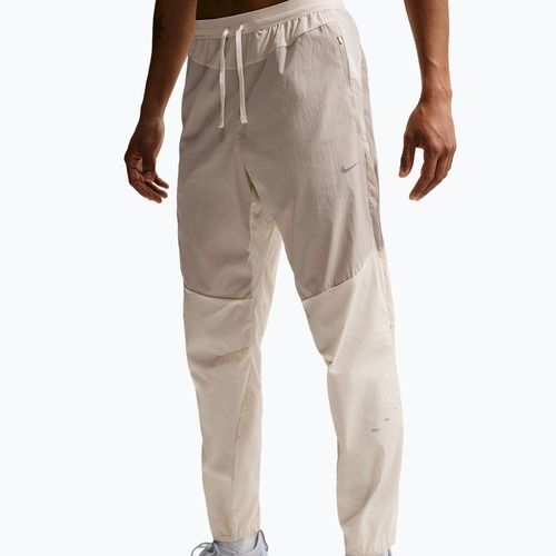 Pantaloni de alergare pentru bărbați Nike Stride Repel Woven cream li/birch/natural