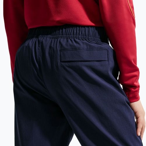 Pantaloni de fotbal pentru copii Nike FC Barcelona Tech Woven blackened blue/black/mineral yellow