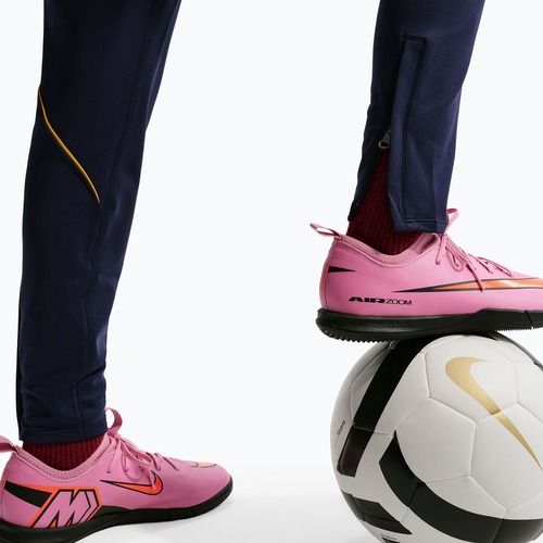 Pantaloni de fotbal pentru copii Nike FC Barcelona Strike Dri-Fit blackened blue/noble red/yellow