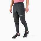 Pantaloni de antrenament pentru bărbați Nike Winterized Woven negru CU7351-010