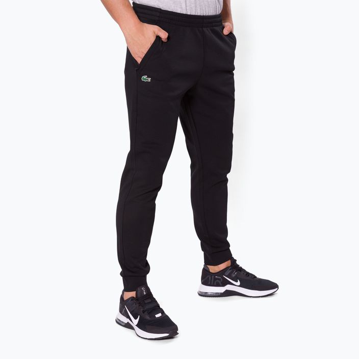 Pantaloni de tenis pentru bărbați Lacoste C31 negru XH9559