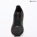 Încălțăminte de alergare pentru femei Mizuno Wave Rider 28 black/evening primrose/poppy red 9