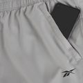 Pantaloni pentru bărbați Reebok Id Train Woven grey 3 4