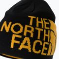 The North Face Reversibil Tnf Banner Reversibil șapcă de iarnă negru și galben NF00AKNDAGG1 3