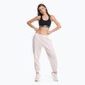 Pantaloni de antrenament New Balance Athletics Nature State French Terry pentru femei, roz WP23553WAN 2