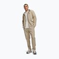 Pantaloni de antrenament pentru bărbați Under Armour Unstoppable Tapered Pants city khaki/black 2
