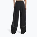 Pantaloni pentru femei Under Armour Unstoppable Woven Wind ultimate black/anthracite/anthracite 3