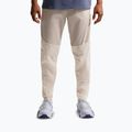 Pantaloni de alergare pentru bărbați Nike Stride Repel Woven cream li/birch/natural
