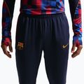 Pantaloni de fotbal pentru bărbați Nike FC Barcelona Strike Dri-Fit blackened blue/noble red/yellow 6