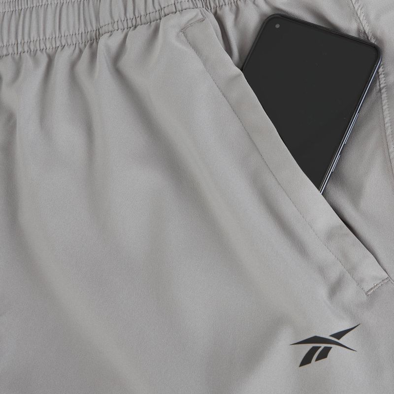 Pantaloni pentru bărbați Reebok Id Train Woven grey 3 4
