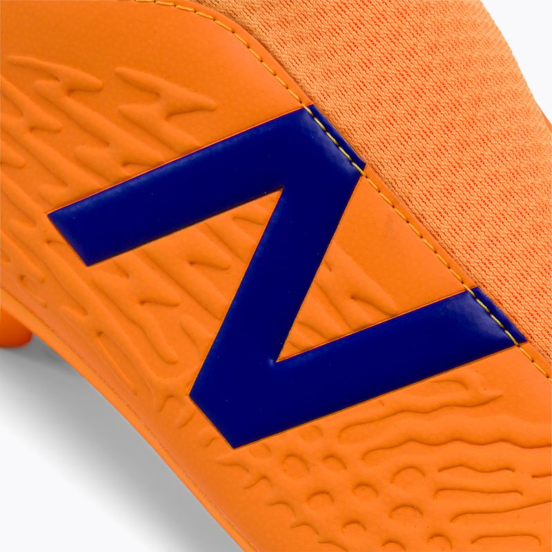 Ghete de fotbal pentru copii New Balance Tekela V3+ Magique FG portocaliu JST3FD35.M.045 7
