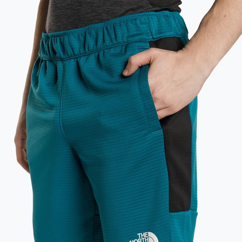 Pantaloni scurți de alergare pentru bărbați The North Face MA Fleece albastru NF0A823OES31 3