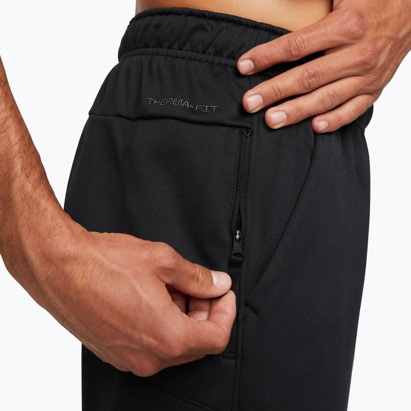 Pantaloni de antrenament Nike Therma-FIT Open Hem black/black/white 4