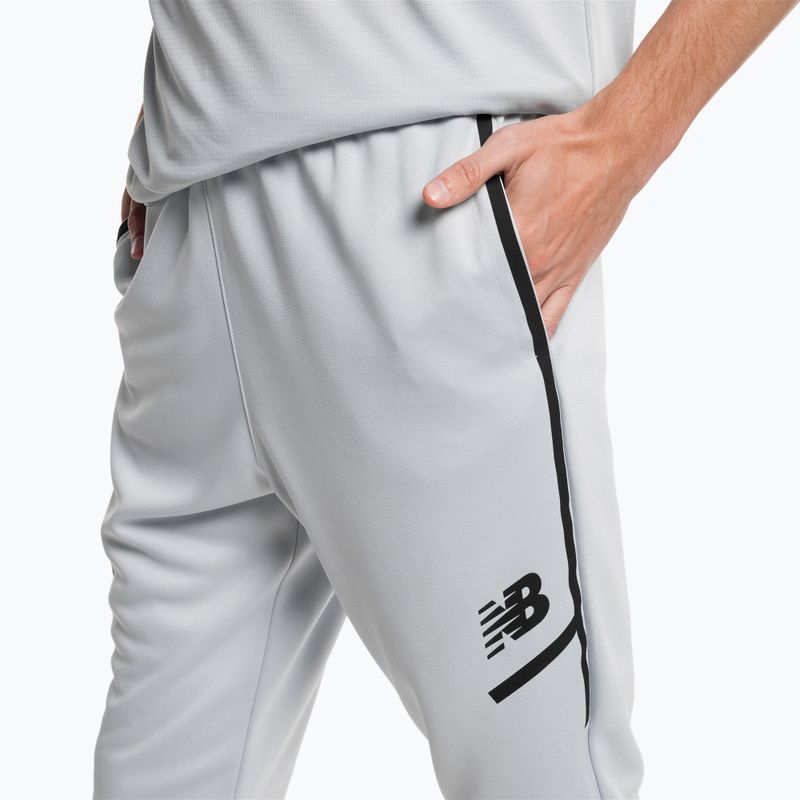 Pantaloni de antrenament pentru bărbați New Balance Tenacity Football albastru NBMP23091LAN 4