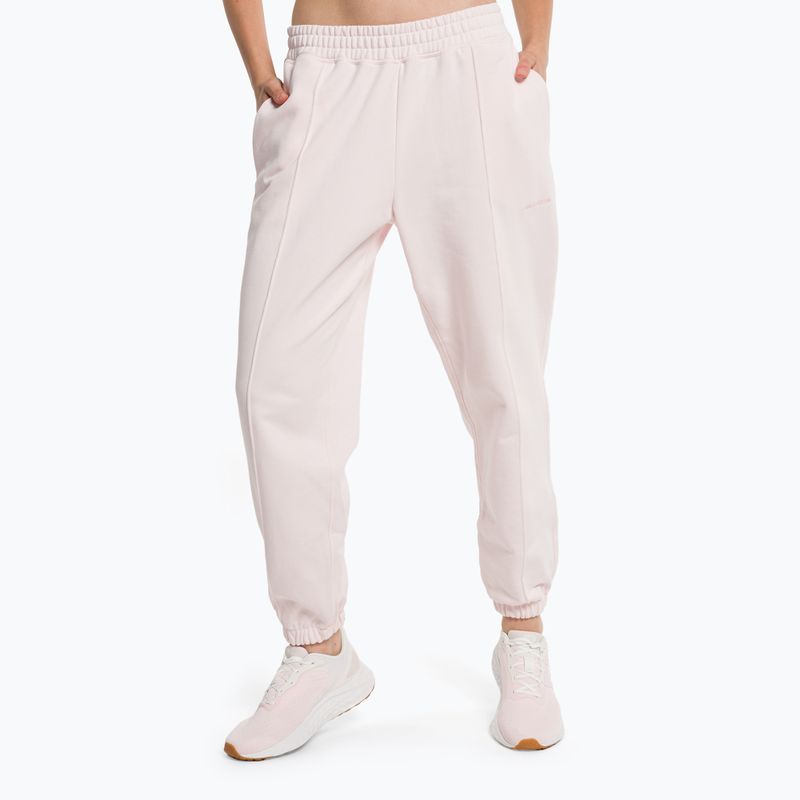 Pantaloni de antrenament New Balance Athletics Nature State French Terry pentru femei, roz WP23553WAN