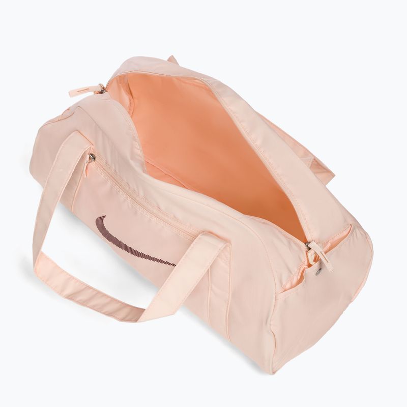 Geantă de antrenament Nike Gym Club 24 l guava ice/guava ice/night maroon 5