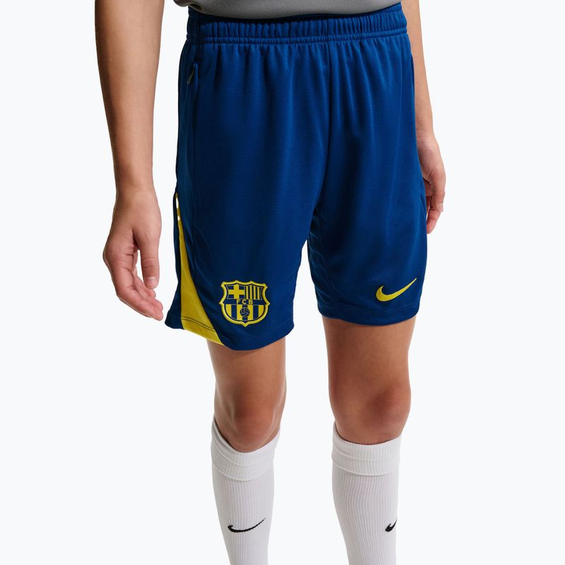 Pantaloni scurți de fotbal pentru copii Nike FC Barcelona Strike SE Jr gym blue/opti yellow/opti yellow 7