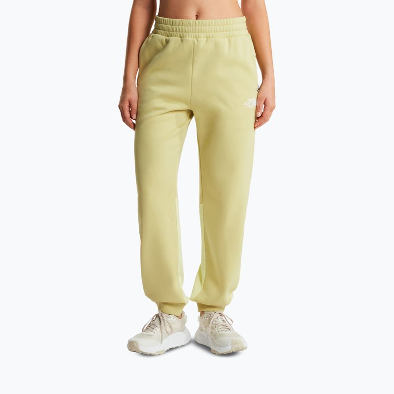 Pantaloni pentru femei The North Face Mountain Athletics Fleece pear