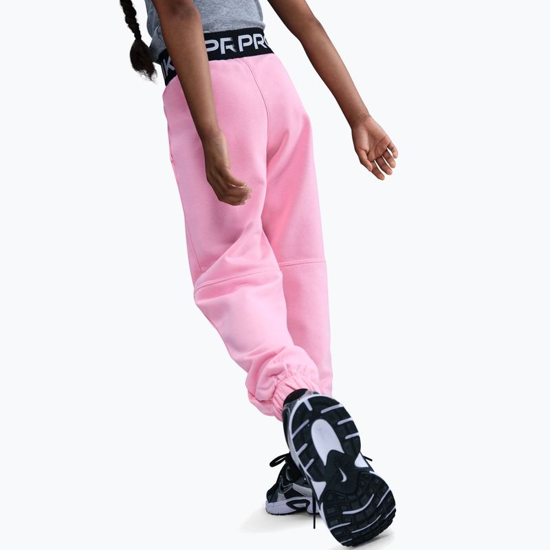 Pantaloni pentru copii Nike Pro Fleece Dri-Fit med soft pink/med soft pink/black/white 6