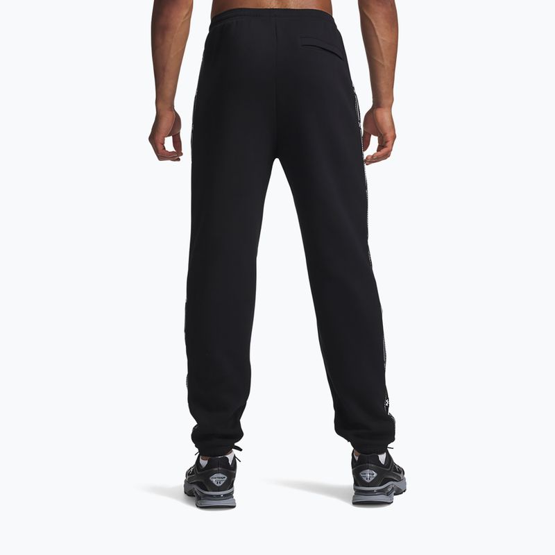 Pantaloni pentru bărbați Under Armour Icon Fleece Taped Jogger ultimate black/white 3