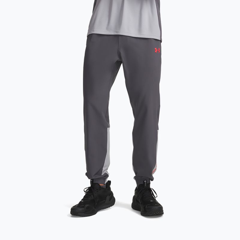 Pantaloni de antrenament pentru bărbați Under Armour Tech Utility Woven Pants castlerock/mod gray/racer red