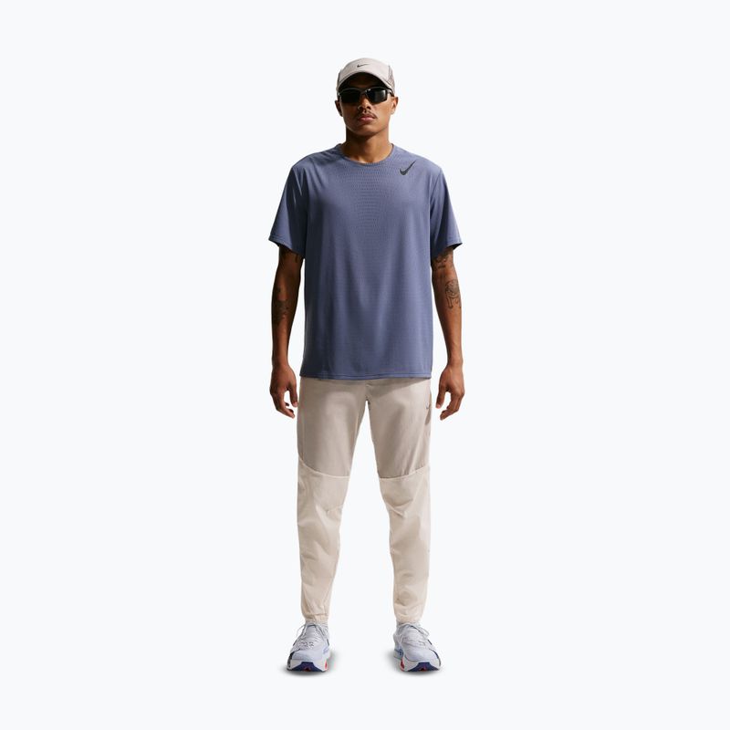 Pantaloni de alergare pentru bărbați Nike Stride Repel Woven cream li/birch/natural 2