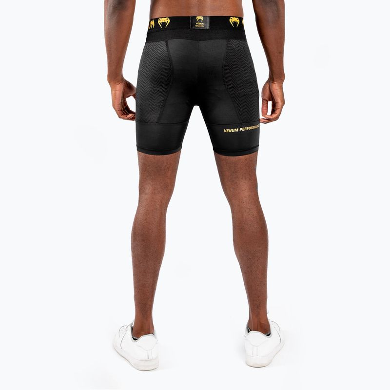 Pantaloni scurți de antrenament pentru bărbați Venum G-Fit Compression black/gold 2