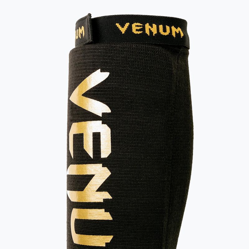 Protecții de tibie Venum Kontact Without Foot black/gold
