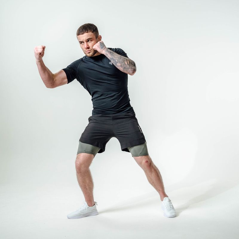 Pantaloni scurți de antrenament RDX T16 black/grey 12