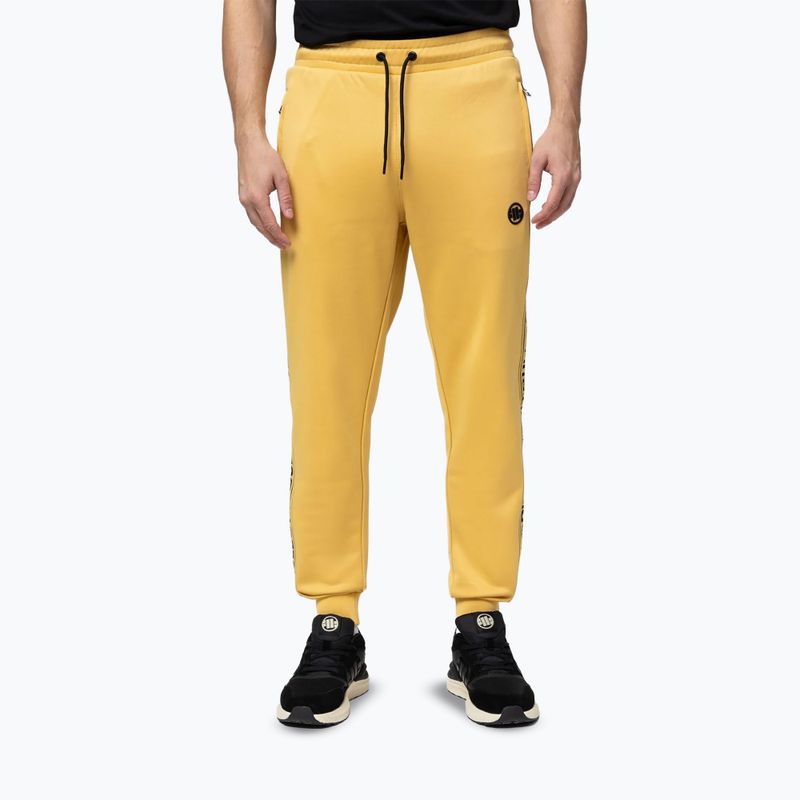 Pantaloni pentru bărbați Pitbull Trackpants Tape Logo Terry Group pale yellow
