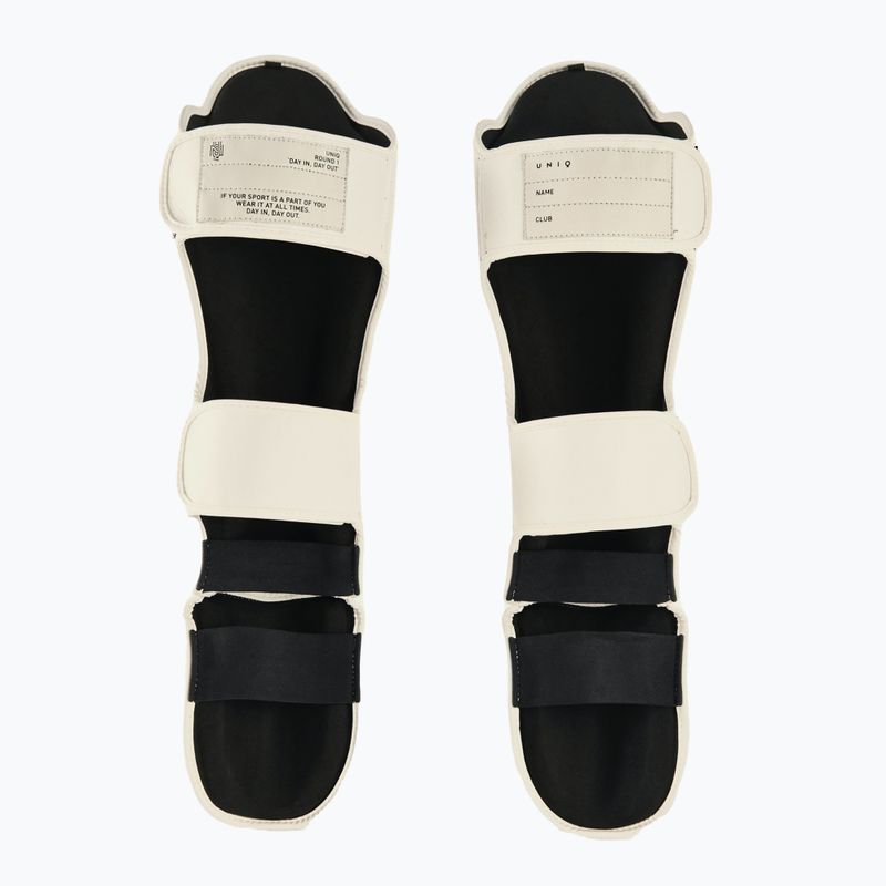 Protectori pentru tibie UNIQ UQSG2 technical white 2