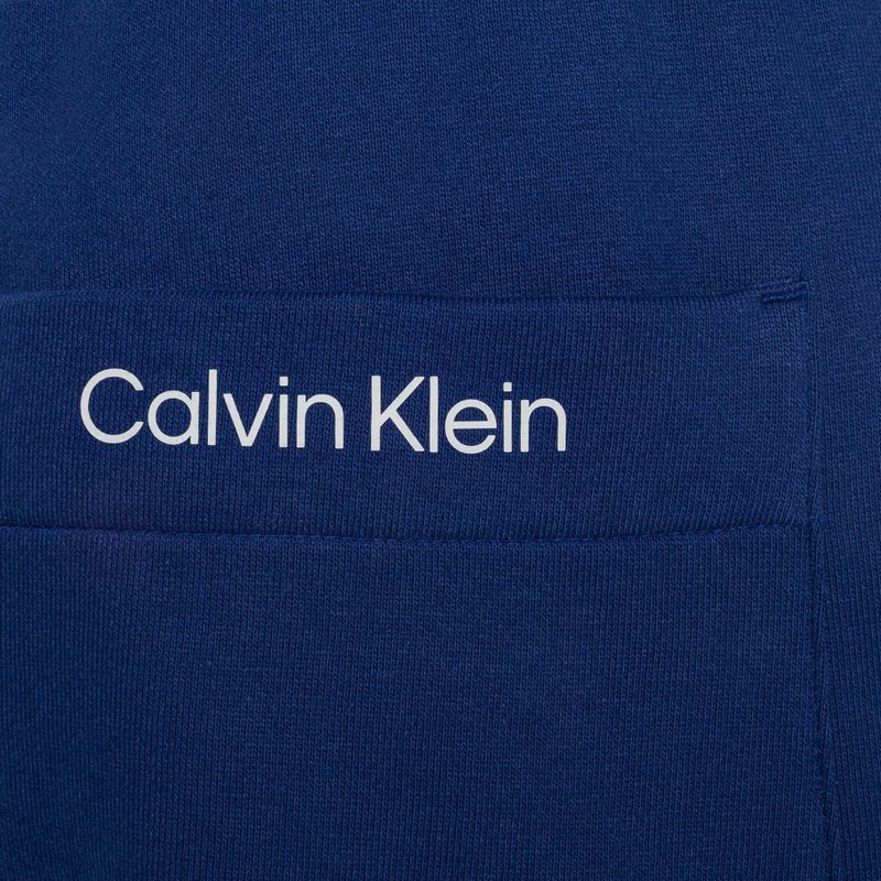 Bărbați Calvin Klein 7" Knit 6FZ pantaloni scurți de antrenament de profunzime albastru pentru bărbați 7