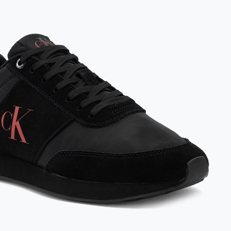 Încălțăminte pentru bărbați Calvin Klein HM0HM02212 Retro Runner Bans Leather Suede triple black/adrenaline rush 7