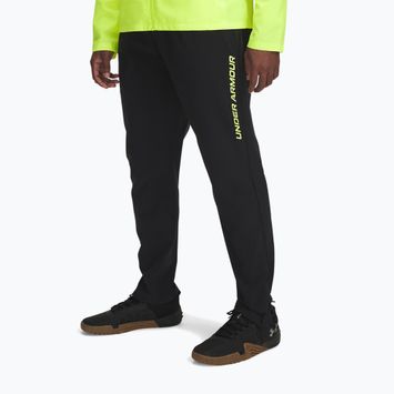 Pantaloni de alergare pentru bărbați Under Armour Storm Run black / high vis yellow / reflective