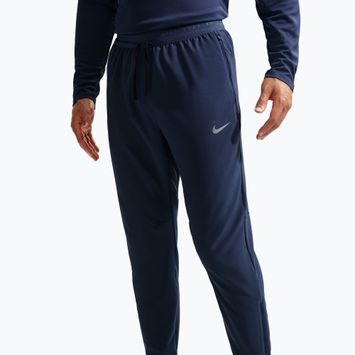 Pantaloni de alergare pentru bărbați Nike Stride Dri-Fit Woven midnight navy