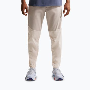 Pantaloni de alergare pentru bărbați Nike Stride Repel Woven cream li/birch/natural