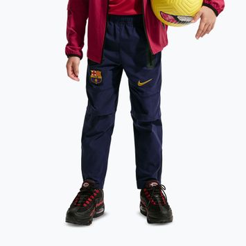 Pantaloni de fotbal pentru copii Nike FC Barcelona Tech Woven blackened blue/black/mineral yellow