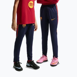 Pantaloni de fotbal pentru copii Nike FC Barcelona Strike Dri-Fit blackened blue/noble red/yellow