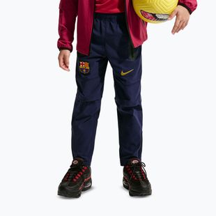 Pantaloni de fotbal pentru copii Nike FC Barcelona Tech Woven blackened blue/black/mineral yellow