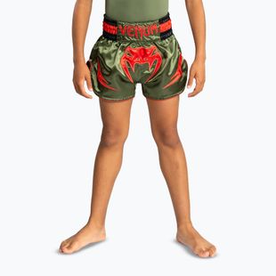 Pantaloni scuți de antrenament pentru copii Venum Inferno Kids Muay Thai army green/orange